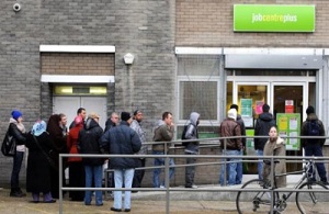 A queue of job seekers outside a job centre in North London this morning. unemployment unemployed